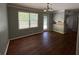 Cozy dining area with laminate flooring, natural light, and doorway to kitchen at 4416 Arcadia Dr, Norcross, GA 30093