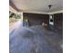 A covered garage with brick walls, with space for storage and vehicles at 4416 Arcadia Dr, Norcross, GA 30093