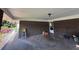 A covered garage with brick walls, with space for storage and vehicles at 4416 Arcadia Dr, Norcross, GA 30093