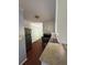 Bright kitchen with stainless steel appliances, granite countertops and wood floors at 4416 Arcadia Dr, Norcross, GA 30093