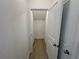 Walk-in closet with ample storage space and neutral finishes at 5377 Heron Bay Blvd, Locust Grove, GA 30248