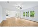 Bright, open-concept living space with view of kitchen and backyard at 5377 Heron Bay Blvd, Locust Grove, GA 30248