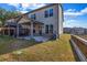 View of the backyard featuring a covered patio at 7884 Rock Rose Ln, Fairburn, GA 30213