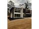Striking two-story home with a modern design and landscaped yard at 1921 Herbert Dr, Tucker, GA 30084