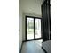 Bright foyer features a modern glass door and view to the outdoors at 1921 Herbert Dr, Tucker, GA 30084