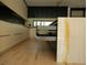 Close-up of the kitchen island highlighting the marble countertops and storage at 1921 Herbert Dr, Tucker, GA 30084
