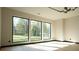 Living room with natural light, big windows that bring the outdoors in, and modern fixtures at 1921 Herbert Dr, Tucker, GA 30084