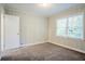 Bedroom featuring neutral paint, carpeted floor, and ample natural light at 2529 Habersham Dr, Decatur, GA 30032
