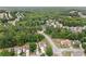 An aerial view captures the home's neighborhood with mature trees and landscaping at 4405 Feather Way, Douglasville, GA 30135