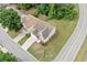 An aerial view showcases the home's architecture, complemented by lush greenery and a well-kept lawn at 4405 Feather Way, Douglasville, GA 30135