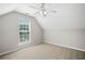 Bedroom with a window and gray carpet at 4405 Feather Way, Douglasville, GA 30135