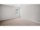 Bedroom with a ceiling fan, window with blinds, and gray walls at 4405 Feather Way, Douglasville, GA 30135