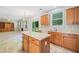 Kitchen with an island that offers seating and lots of workspace, connecting to the living room at 4405 Feather Way, Douglasville, GA 30135