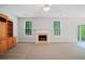 Inviting living room featuring a fireplace and large windows at 4405 Feather Way, Douglasville, GA 30135