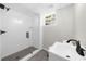 Updated bathroom featuring a glass shower with subway tile, complemented by a modern vanity at 7300 Wynhill Dr, Sandy Springs, GA 30328