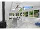 Bright breakfast area with vaulted ceiling, skylights and oversized windows at 7300 Wynhill Dr, Sandy Springs, GA 30328