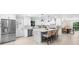 Stylish kitchen with stainless steel appliances, a center island, and an open dining area at 7300 Wynhill Dr, Sandy Springs, GA 30328
