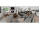 Spacious living room showcasing a fireplace, and an open layout to the kitchen at 7300 Wynhill Dr, Sandy Springs, GA 30328