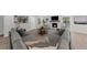 Comfortable living room with a cozy fireplace and plush sectional sofa at 7300 Wynhill Dr, Sandy Springs, GA 30328