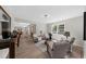 Spacious living room with hardwood floors and natural light through large window at 7300 Wynhill Dr, Sandy Springs, GA 30328