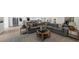 Expansive living room featuring an open floor plan to the kitchen and dining areas at 7300 Wynhill Dr, Sandy Springs, GA 30328