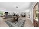 Open-concept living space with hardwood floors and natural light, perfect for entertaining and Gathering time at 7300 Wynhill Dr, Sandy Springs, GA 30328