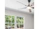 Bright room with large windows, providing ample natural light and a view of the surrounding greenery at 7300 Wynhill Dr, Sandy Springs, GA 30328