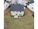 Aerial view of the backyard featuring a patio seating area and lawn at 1116 Silverbrooke Dr, Powder Springs, GA 30127