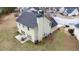 Aerial view of the backyard featuring a patio seating area and lawn at 1116 Silverbrooke Dr, Powder Springs, GA 30127