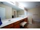Bright bathroom featuring double vanity, large mirror, and ample counter space at 1116 Silverbrooke Dr, Powder Springs, GA 30127