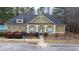 Charming single-story building with shake siding, inviting entry, and visible accessible parking at 1116 Silverbrooke Dr, Powder Springs, GA 30127