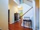 Inviting foyer with hardwood floors, staircase, and charming decor welcomes you home at 1116 Silverbrooke Dr, Powder Springs, GA 30127