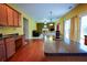 Open-concept kitchen with a breakfast bar overlooking the living room, perfect for entertaining guests at 1116 Silverbrooke Dr, Powder Springs, GA 30127