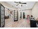 Large bonus room with a mirrored closet, study area, and access to a bathroom at 127 Marlow Dr, Woodstock, GA 30188