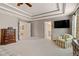 Spacious main bedroom with sitting area and en-suite bathroom at 127 Marlow Dr, Woodstock, GA 30188