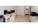 Functional office space with carpet, a desk, and ample storage for remote work at 127 Marlow Dr, Woodstock, GA 30188