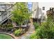 Beautifully landscaped side yard with a stone pathway and lush greenery at 127 Marlow Dr, Woodstock, GA 30188