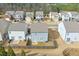 Aerial view of a neighborhood with various home designs and well-maintained yards at 137 Centennial Ridge Dr, Acworth, GA 30102