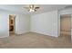 Spacious bedroom with neutral carpet and access to a bathroom and another bedroom at 137 Centennial Ridge Dr, Acworth, GA 30102