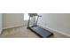 Bedroom with a window featuring a treadmill for exercise at 137 Centennial Ridge Dr, Acworth, GA 30102