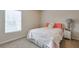 Cozy bedroom featuring a bed, nightstand and a window at 137 Centennial Ridge Dr, Acworth, GA 30102