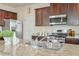Kitchen featuring stainless steel appliances, granite countertops, and ample cabinet space at 137 Centennial Ridge Dr, Acworth, GA 30102