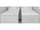 Matching white washer and dryer set ready for all laundry needs at 1432 Forest Villa Dr, Conyers, GA 30012