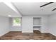 Cozy living room featuring hardwood flooring and a window with natural light at 1432 Forest Villa Dr, Conyers, GA 30012