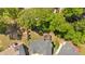 Aerial shot of a home showing deck, backyard, and landscaping within a residential area at 3921 Upland Way, Marietta, GA 30066