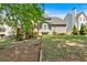 Well-maintained backyard with lawn, showcasing the home's rear exterior with lots of light at 3921 Upland Way, Marietta, GA 30066
