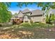 Green backyard featuring a lovely deck and well-kept lawn perfect for leisure and outdoor enjoyment at 3921 Upland Way, Marietta, GA 30066