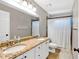 Bathroom featuring a double vanity with granite countertop and a shower with curtain at 3921 Upland Way, Marietta, GA 30066