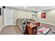 Cozy den featuring a comfortable sofa, wood-look flooring, and stylish decor at 3921 Upland Way, Marietta, GA 30066