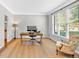 Bright home office with large windows, jute rug, and ample natural light at 3921 Upland Way, Marietta, GA 30066